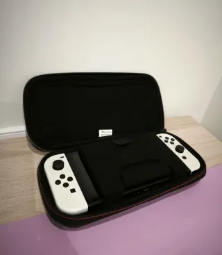 Nintendo Switch OLED bianco + 5 giochi + controller Pro
