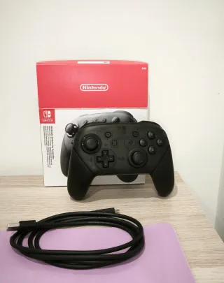 Nintendo Switch OLED bianco + 5 giochi + controller Pro