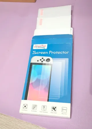 Nintendo Switch OLED bianco + 5 giochi + controller Pro