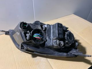 Faro delantero izquierdo Opel Antara.