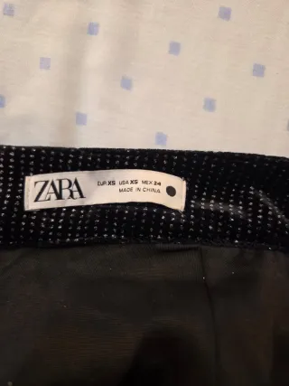 Falda brillos plateados talla XS