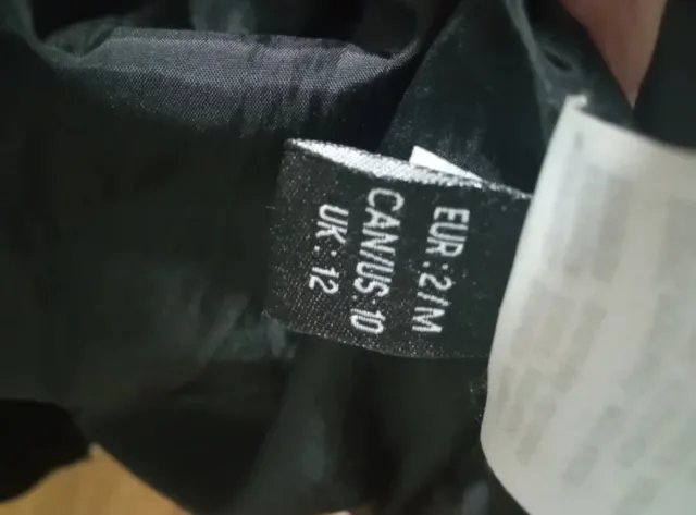 Cazadora Canadian Peak negra en perfecto estado