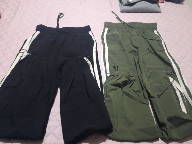 Pantalón deportivo negro y verde sin usar