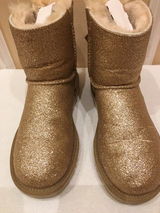 Botas UGG doradas brillantes