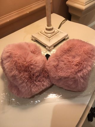 Puños pelo sintético rosa