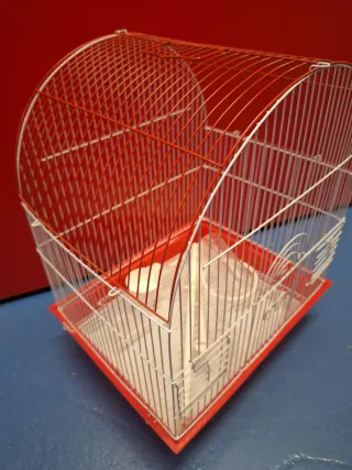 Jaula para pájaros con accesorios