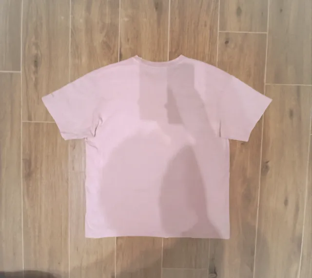 Maglietta rosa pastello con stampa