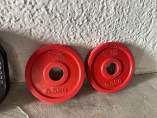 Barra de pesas con discos