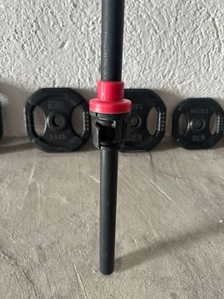 Barra de pesas con discos