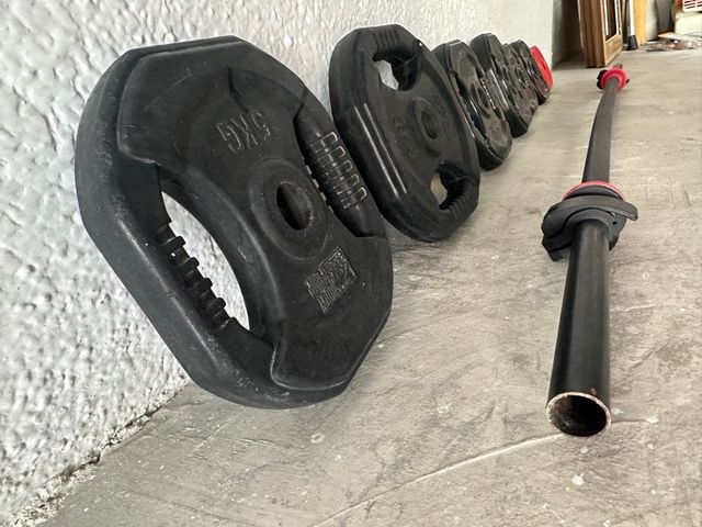 Barra de pesas con discos