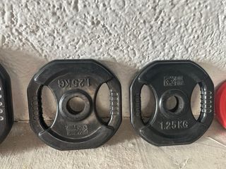 Barra de pesas con discos