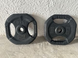 Barra de pesas con discos