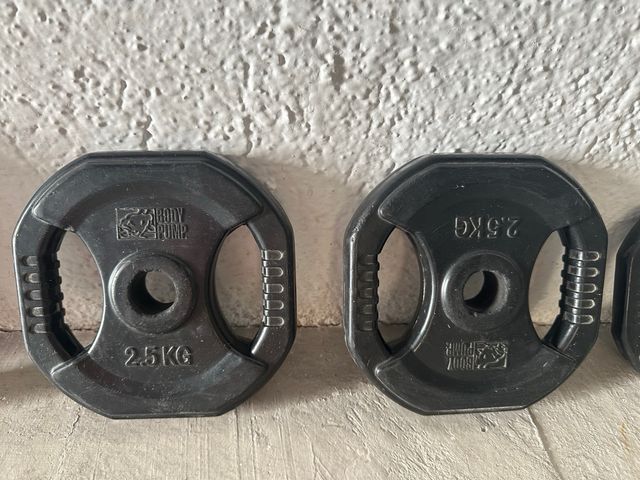 Barra de pesas con discos