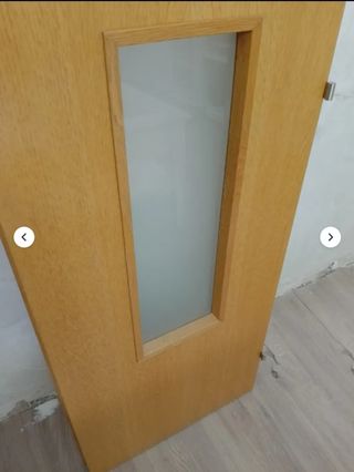 Puerta doble hoja madera maciza.