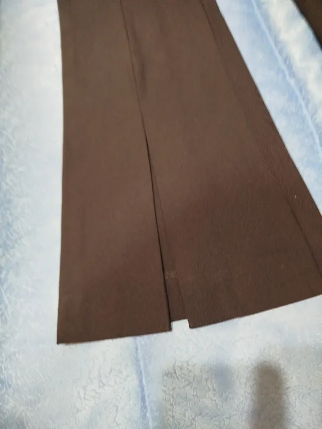 Pantalón tela con abertura pierna cintura 87 .