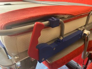 Divano letto rosso in tessuto