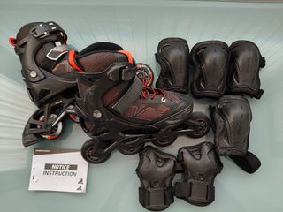 Patines en línea Oxelo negros y naranjas