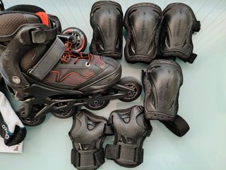 Patines en línea Oxelo negros y naranjas