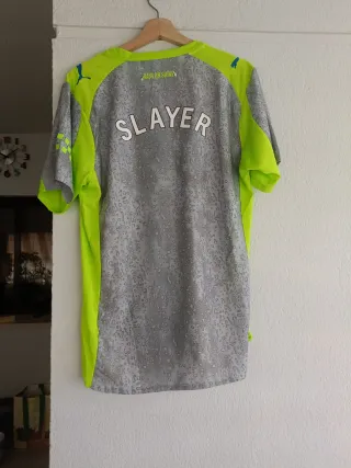 Camiseta deportiva Puma gris y verde