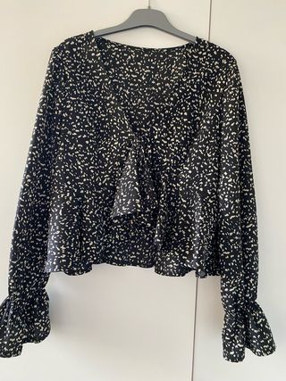 Blusa estampada manga larga