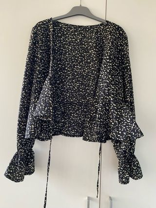 Blusa estampada manga larga