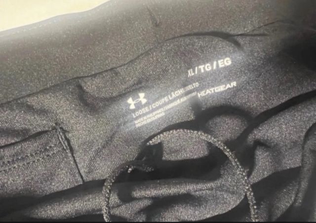 Shorts running Under Armour negros