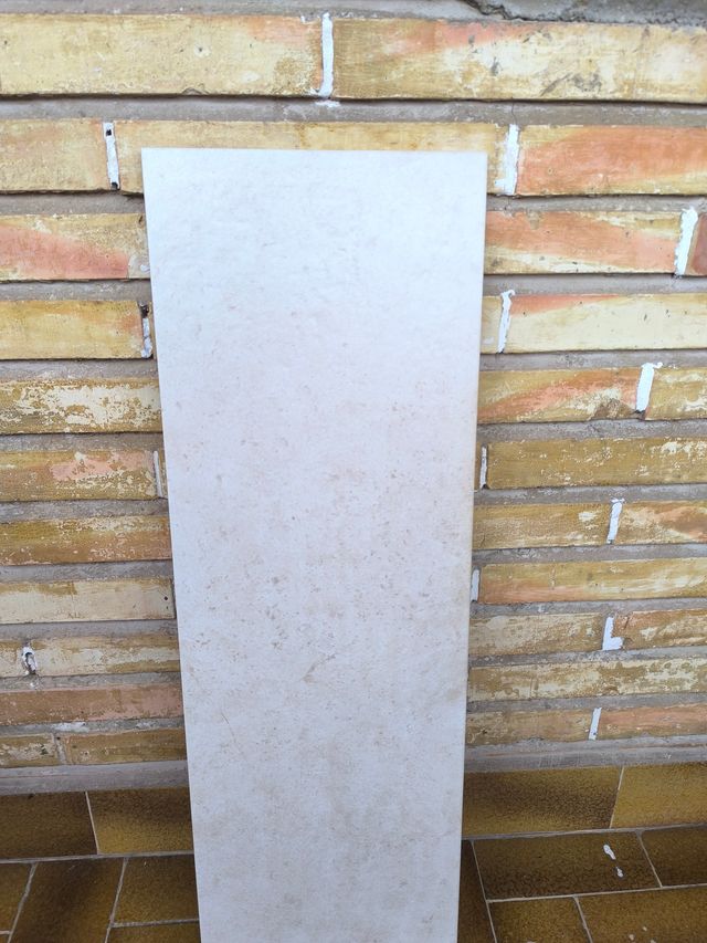 Revestimiento cerámico, restos de obra