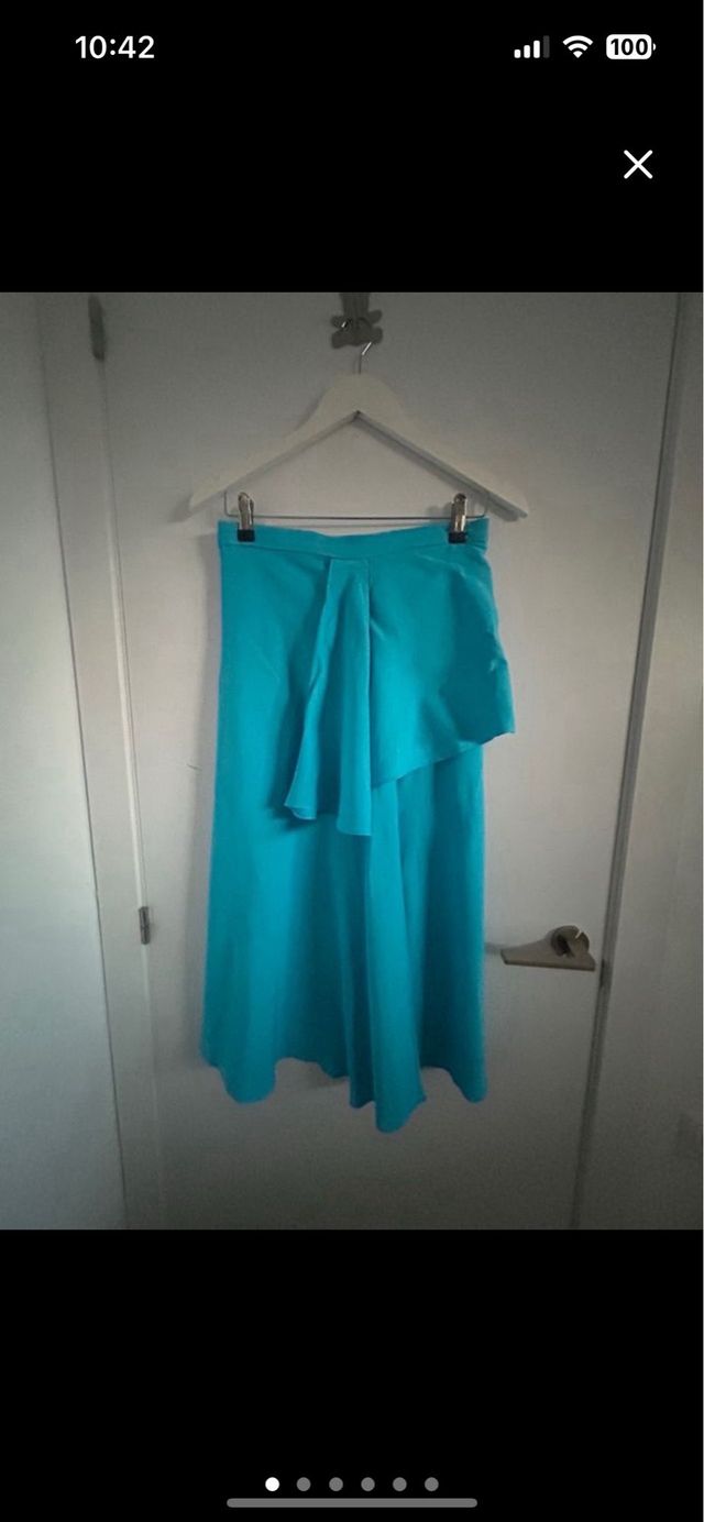 Conjunto top y pantalón azul satinado