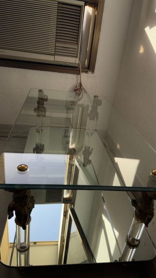 Tavoli in vetro dorato e trasparente 
