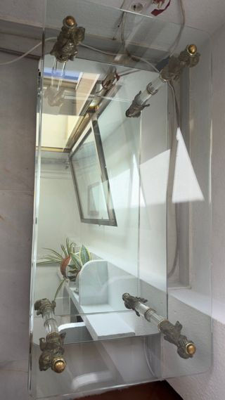 Tavoli in vetro dorato e trasparente 