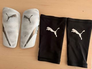Espinilleras Puma Negras y Blancas