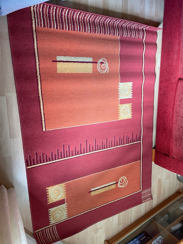 Alfombra salón poliéster naranja y rojo