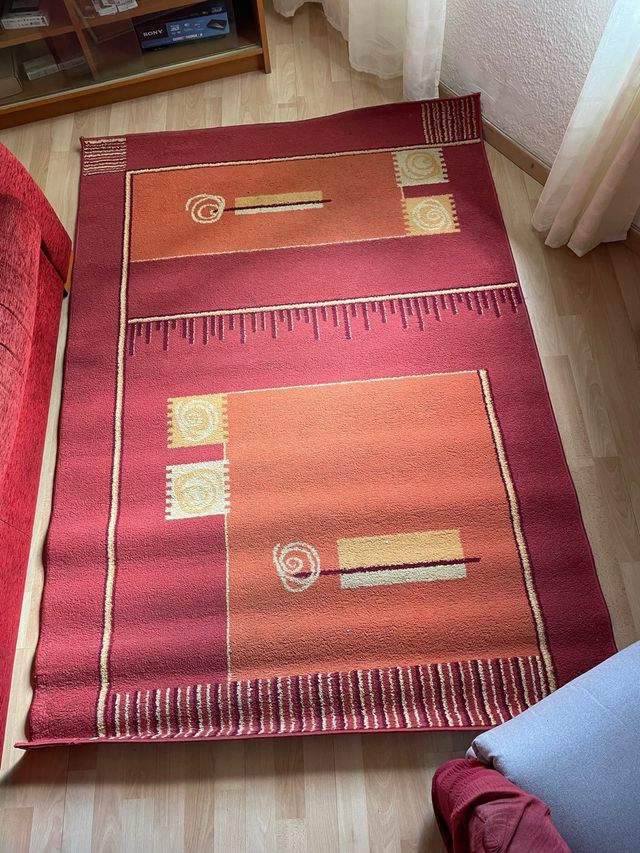Alfombra salón poliéster naranja y rojo