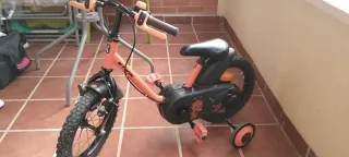 Bicicleta infantil 14 naranja Decathlon