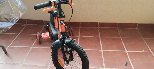 Bicicleta infantil 14 naranja Decathlon