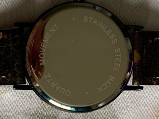 Reloj Quartz Negro y Marrón