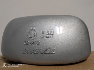 Espejo retrovisor plateado para ampliar campo 

