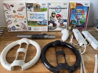Mandos Wii + Volantes y 4 Juegos