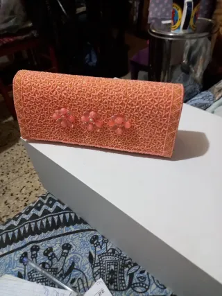 Bolso de fiesta rosa y dorado