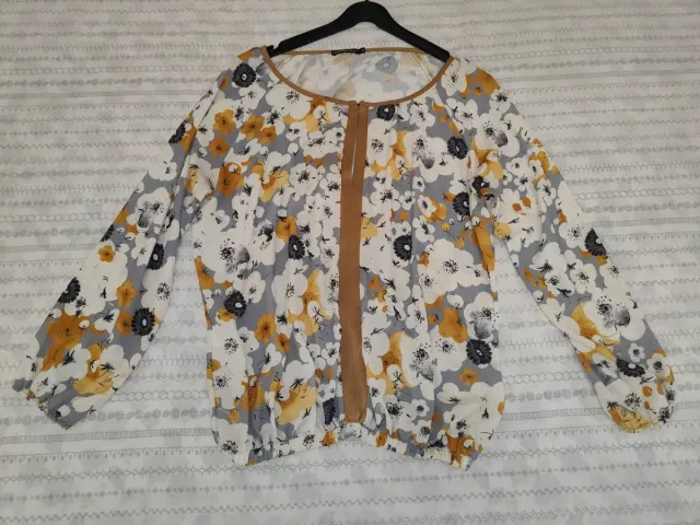 Blusa floral manga larga