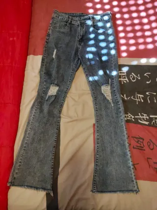 Pantalón vaquero mujer campana rotos talla 38