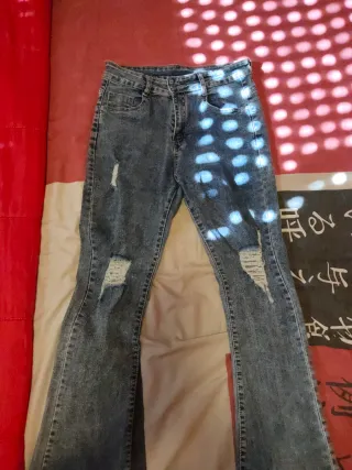 Pantalón vaquero mujer campana rotos talla 38