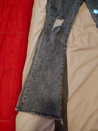 Pantalón vaquero mujer campana rotos talla 38