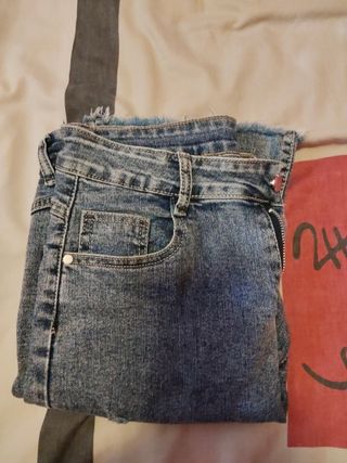 Pantalón vaquero mujer campana rotos talla 38
