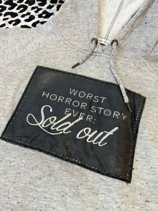 Sudadera gris vintage efecto desgastado