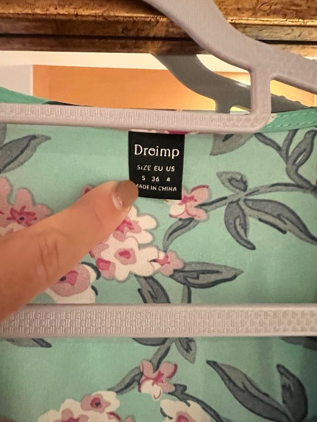 Vestido cruzado floral turquesa