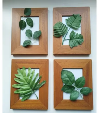 Marcos de madera con hojas decorativas