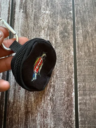 Monedero de pesca PENN con cremallera