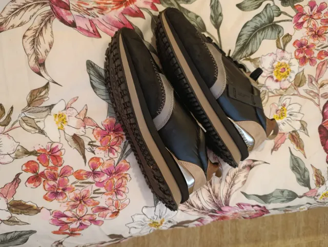 Zapatillas Giuseppe Zanotti negras y doradas