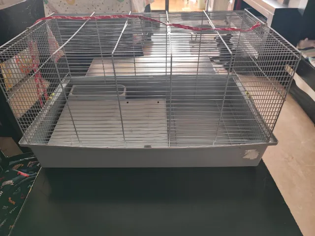 Jaula transporte mascotas gris y blanco